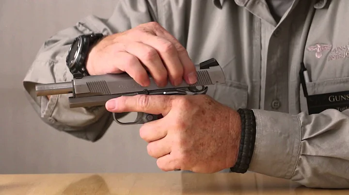 Left handed manipulation of a 1911 pistol