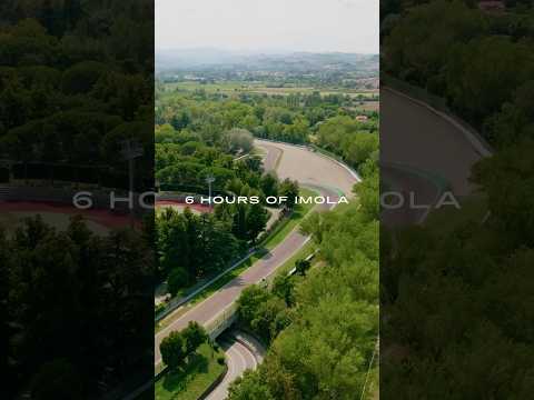 Flat out through the Italian hills at Imola.