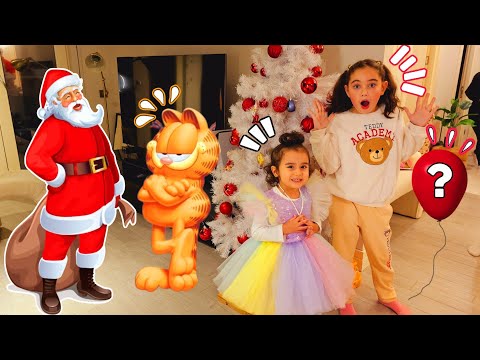 ÖYKÜ ELİF SİNEM NOEL BABA GELDİ!! BAK BALONDAN KİM ÇIKTI?بابا جاب لي بالون - جنى/  مقداد | طيور بيبي