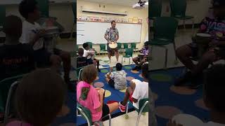 Drum circle at school. Rhythm repeat exercise