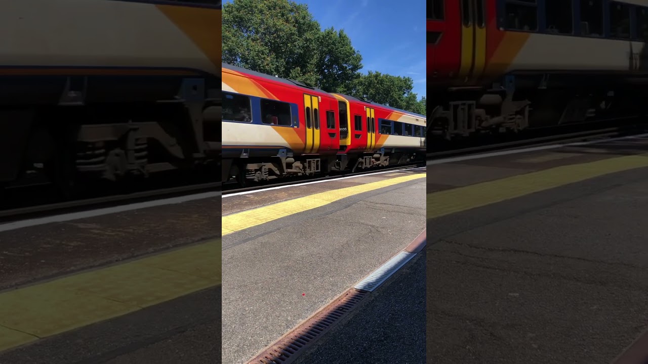 Class 159 passing byfleet and new haw