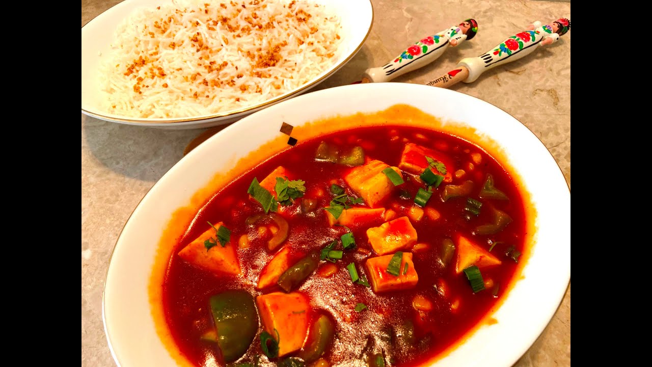 Sweet and sour vegetables with paneer curry