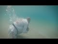 Athlete Running Underwater Carrying A Heavy Rock!