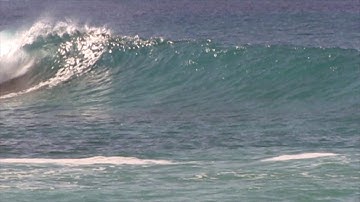Large south swell rolls in to Magic Sands Kona Hawaii Magics Reef
