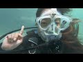 Female Diver is Diving with Neoprene Wetsuit and Mantis Full Face Mask