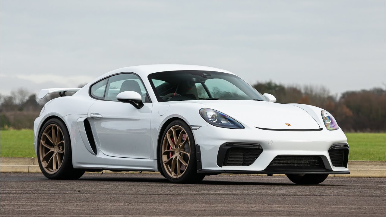 Iconic Auctioneers | 2020 Porsche Cayman GT4 '718' - 1,000 Miles -Sold