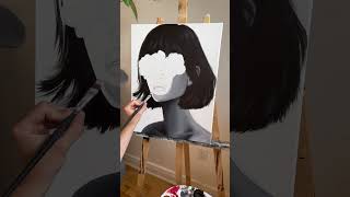 Artist paints a portrait of a woman with flowers over her eyes!