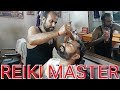 Guasha head massage therapy part two with neck cracking and face wash by Reiki master.