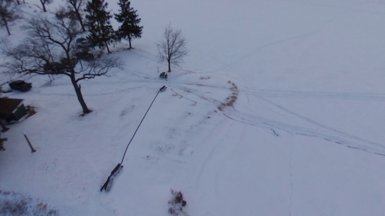 Flying a drone over frozen, Park Lake in Pardeeville, Wisconsin YouTube