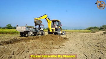 MAHINDRA EARTHMASTER VX BACKHOE LOADER LOADING SOIL In Tractor - MAHINDRA Dozer