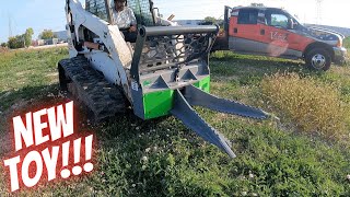 Another awesome skid loader attachment!