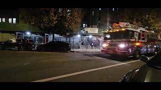 FDNY Ladder 130 Acting Passing By On Mosholu Parkway In Norwood, The Bronx, New York City