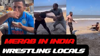 Merab Dvalishvili wrestling locals at the beach in India.