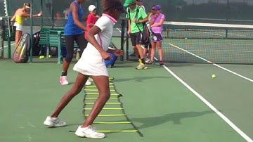 Cori Gauff and Hurricane Tyra Black doing ladder warm up drills