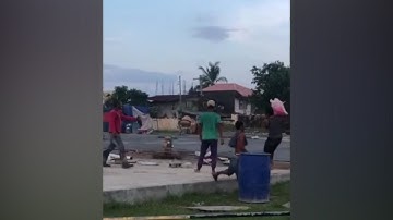 Workers trying to stop a spinning concrete buffer
