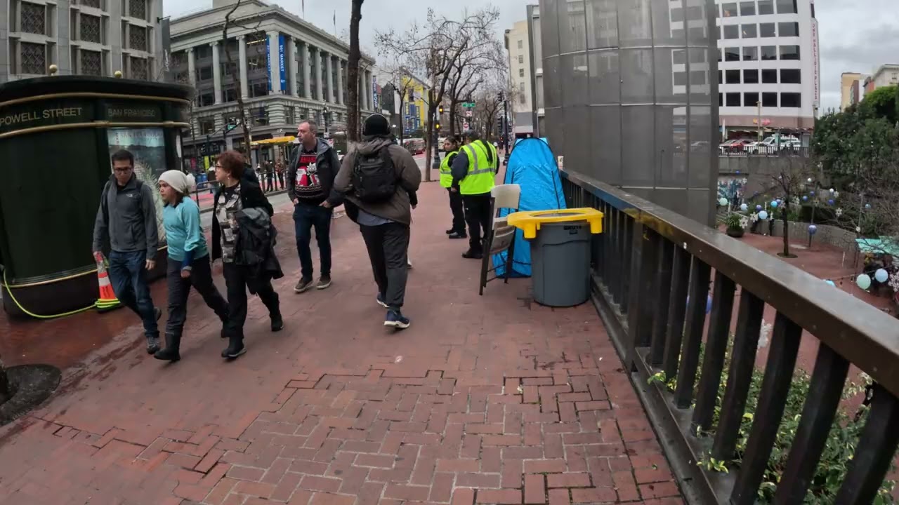 Walking around San Francisco market street, Main Library, Union Square.