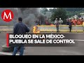 Bloquean carretera México- Puebla para exigir la localización de un niño