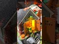 Department 56 Snow Village Halloween Still Running! Set of 2 Building and Figure 6018347