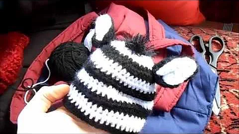 Alice Thacker creates a sample of crochet hats for...