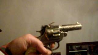 Rick shooting a 1940s cast iron cap gun Bang-o shoots roll caps of 50.