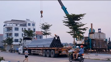 Máy ép cọc dùng cẩu cọc.