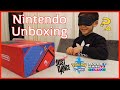 Isaac's surprise Nintendo Switch Mario Red & Blue edition and favorite games unboxing 🎮