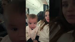 POV: flying 9 hours on a daytime long-haul with a 7-month-old and a child..
