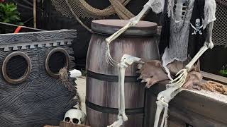 How to paint a blue plastic barrow to look like a whiskey barrel