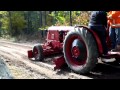 Antique Tractor Grading a Road