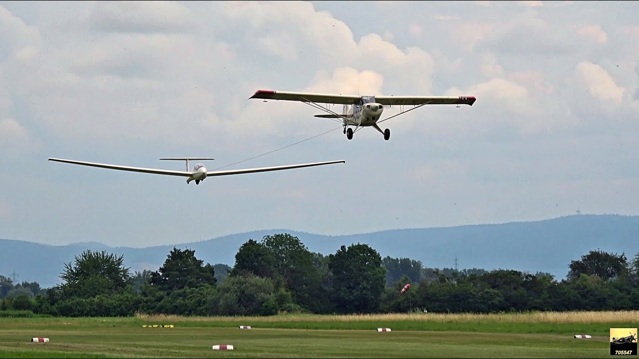 Aviat Husky towing Grob G103a Twin II Glider Plane