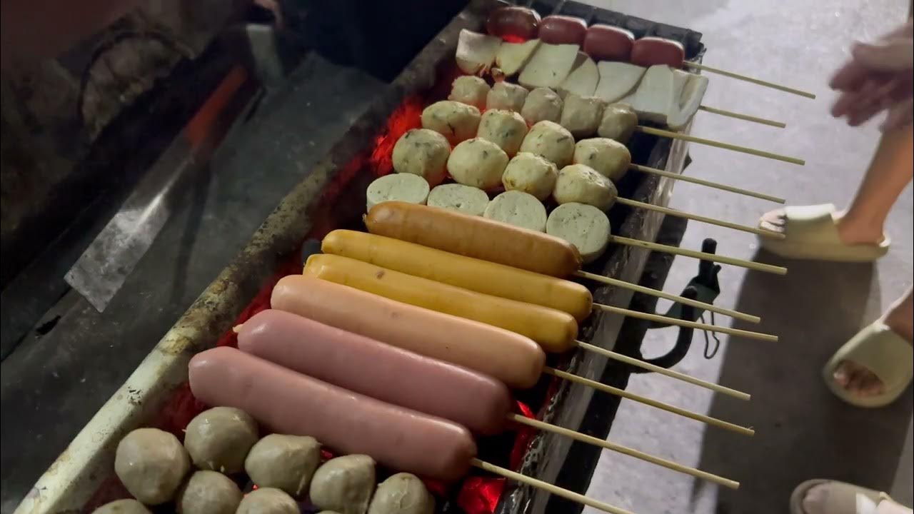 Thai street food grilled meatballs on the roadside Bangkok Thailand 