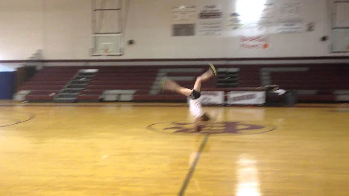 FCAHS Cheerleader replicates William Carey flip-ba...