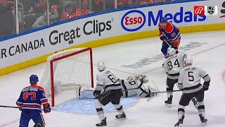 Cam Talbot robs Leon Draisaitl with a glove save.