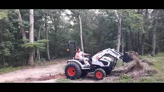 Front loader digging 25 hp Compact Tractor. Bobcat 2025!