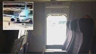 Passengers Shocked When Woman Jumps Out of Plane Taxiing Passengers Shocked When Woman Jumps Out of Plane Taxiing