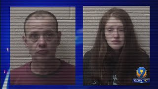 Pair charged after deputies find 3 dead dogs in yard, others in cages