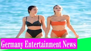 Victoria's Secret model Joy Corrigan shows off her incredible physique in tiny orange bikini as she