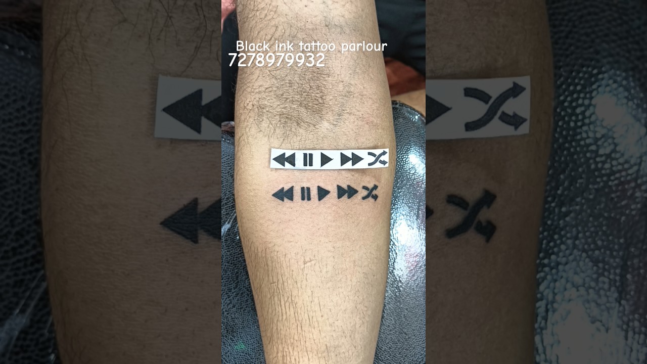 Black Stain tattoo studio - Minimal tattoo infinity with play pause button  location :- @black_stain_tattoo_studio 5 / Basement, Lake Plaza, Nr.  Chinmay Crystal, Opp. Vastrapur Lake, Vastrapur., Ahmedabad, gujrat,  380015, india.