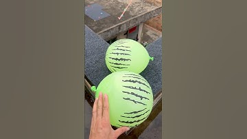 Experiment: Will a water balloon explode if it rolls down from a tall building? 💥🎈 #balloon