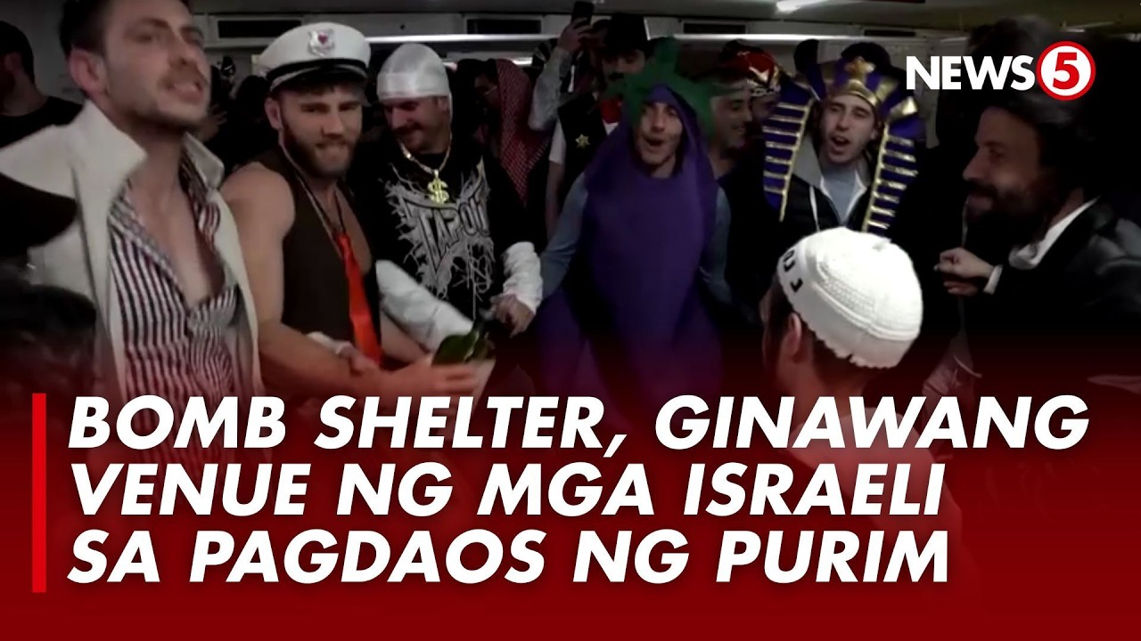 Israelis celebrate Purim in a Tel Aviv underground bomb shelter