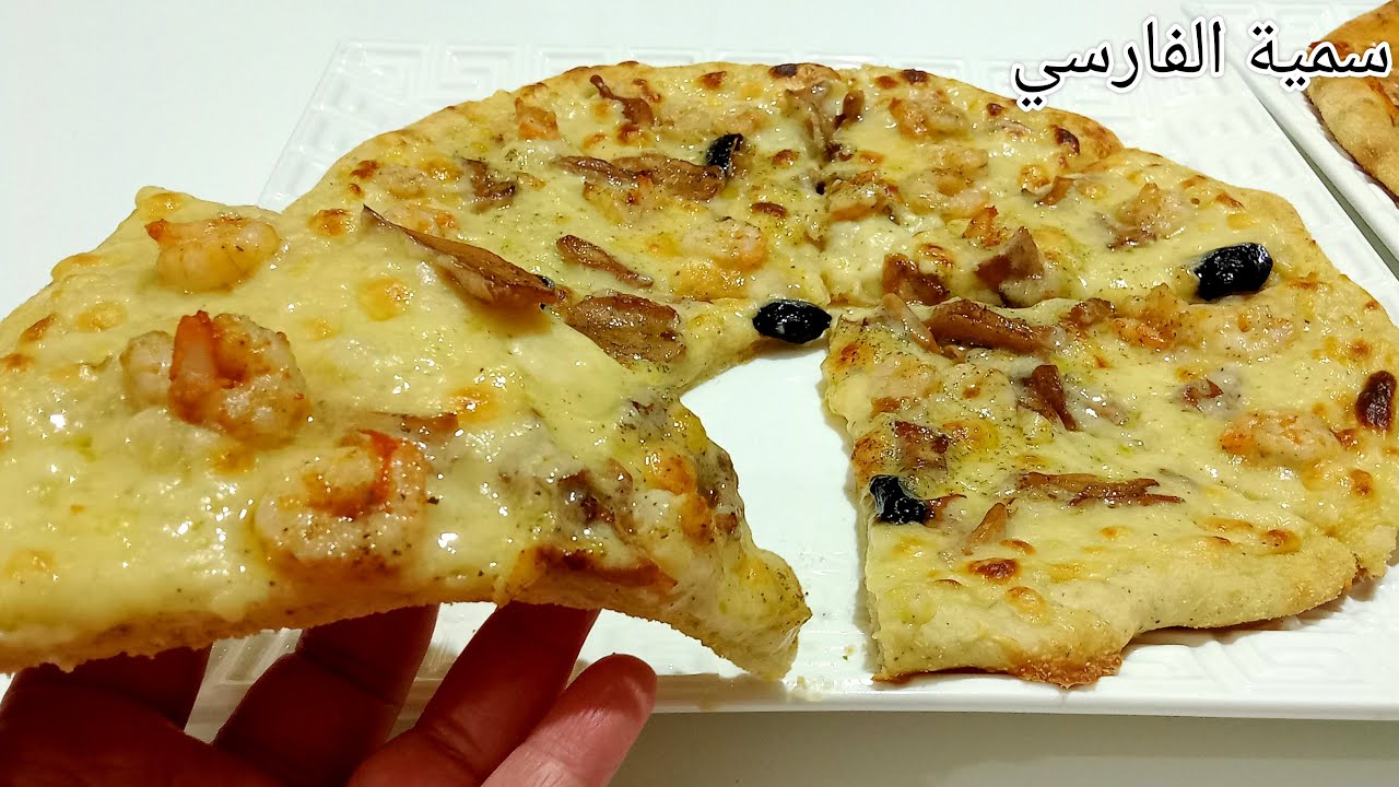 بيتزا بالصلصة البيضاء والكروفيت متل المطاعم الكبرى لذيذة بزاااف قمة فالروووعة