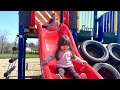 Chloe and meghan enjoy the sunny day at the outdoor playground