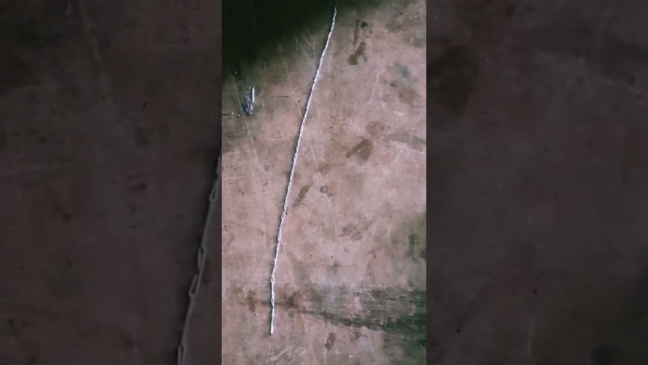 my child making stapler pins chain