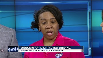 Mock crash shows dangers of distracted driving