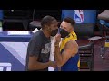 Kevin Durant giving hugs to Steph Curry, Klay and Draymond after the game