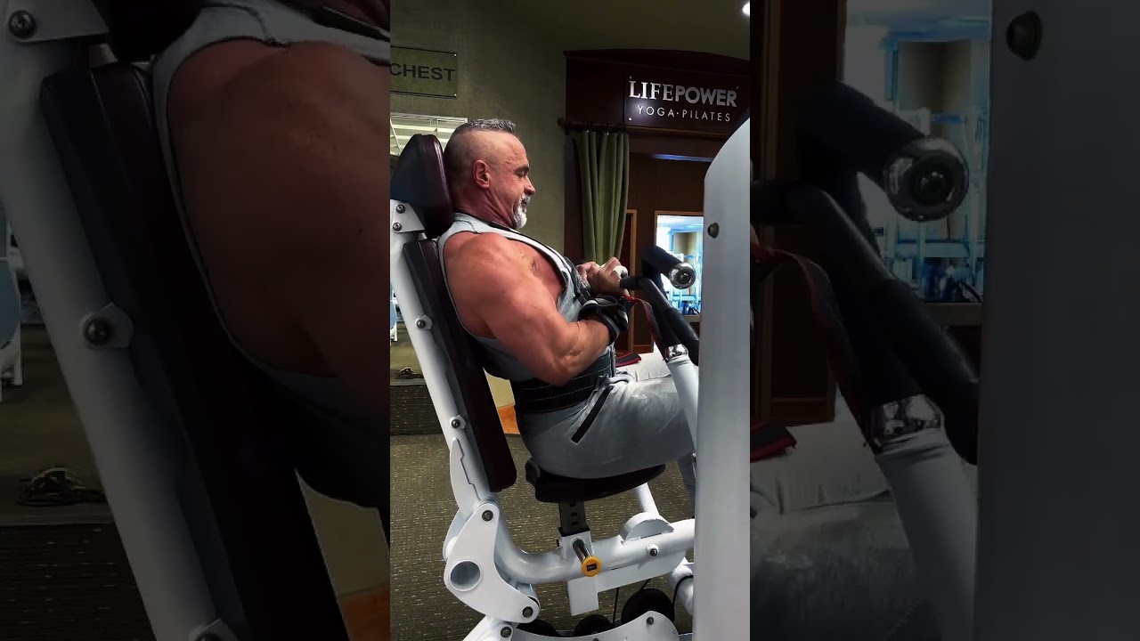 Close grip tricep presses on the chest press machine using a lat bar as your handle for the narrow