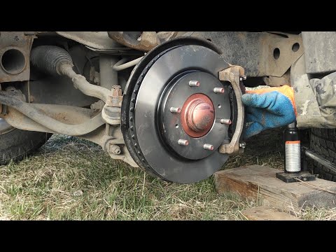 Замена передних тормозных дисков на Pajero Sport II.
