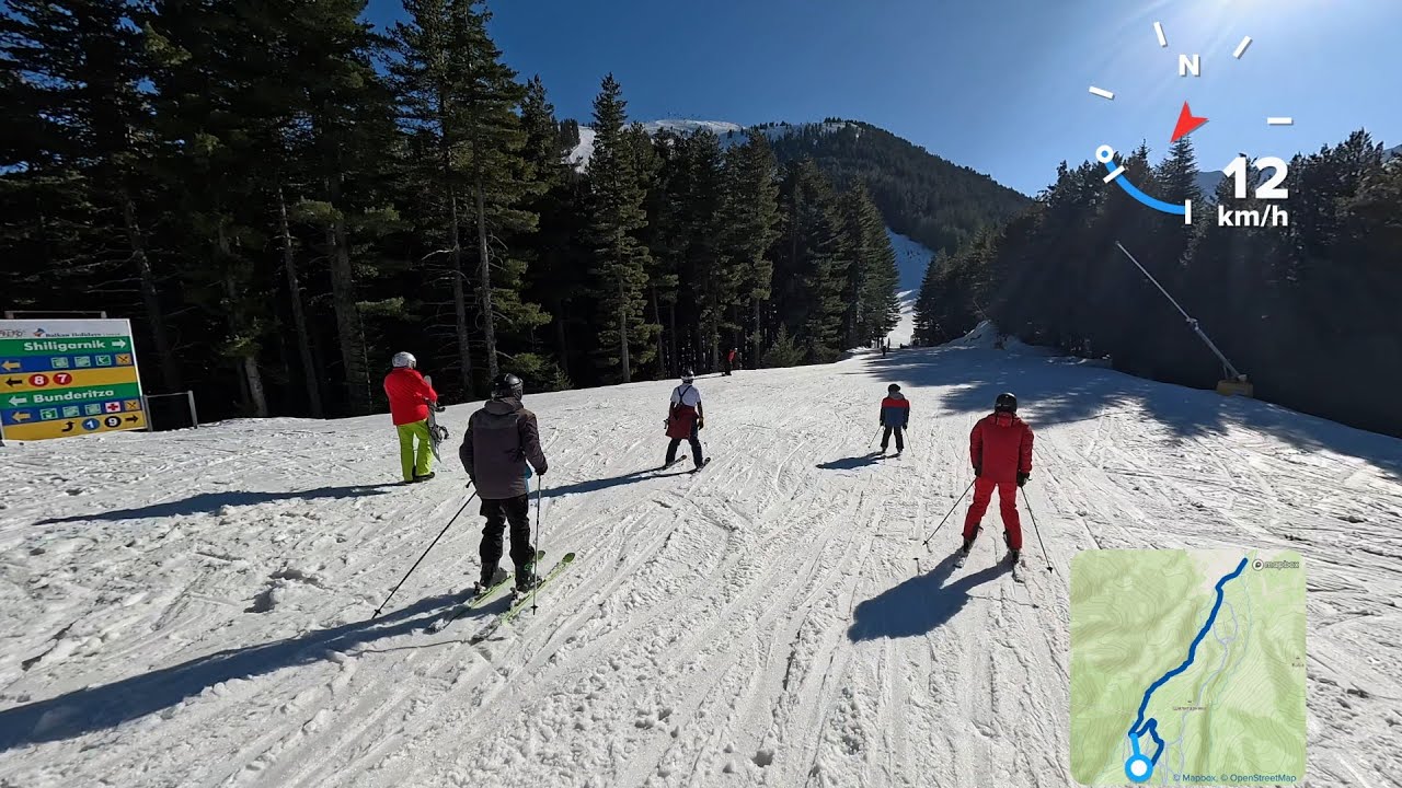 Bansko, Bulgaria, March 2025: Kolarski(easy blue slope) and the ski road