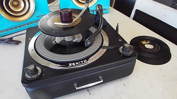 Zenith Cobramatic 4 speed automatic record changer playing a stack of 45