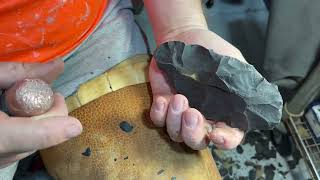 Direct percussion with solid copper bopper. Rock to biface.